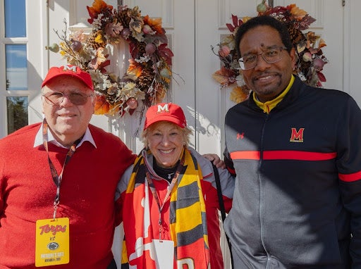 Marsha and Henry Laufer with President Pines.